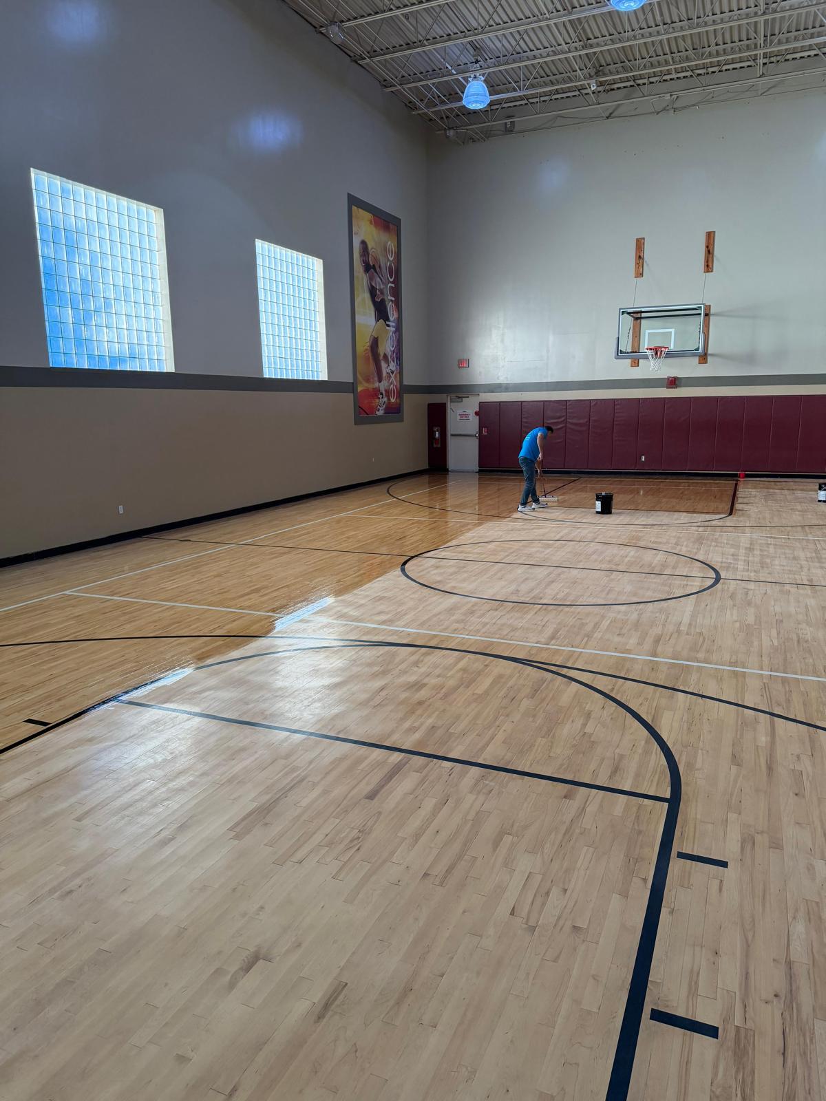 LA Fitness athletic hardwood floor after full sand and refinish — Orlando, FL
