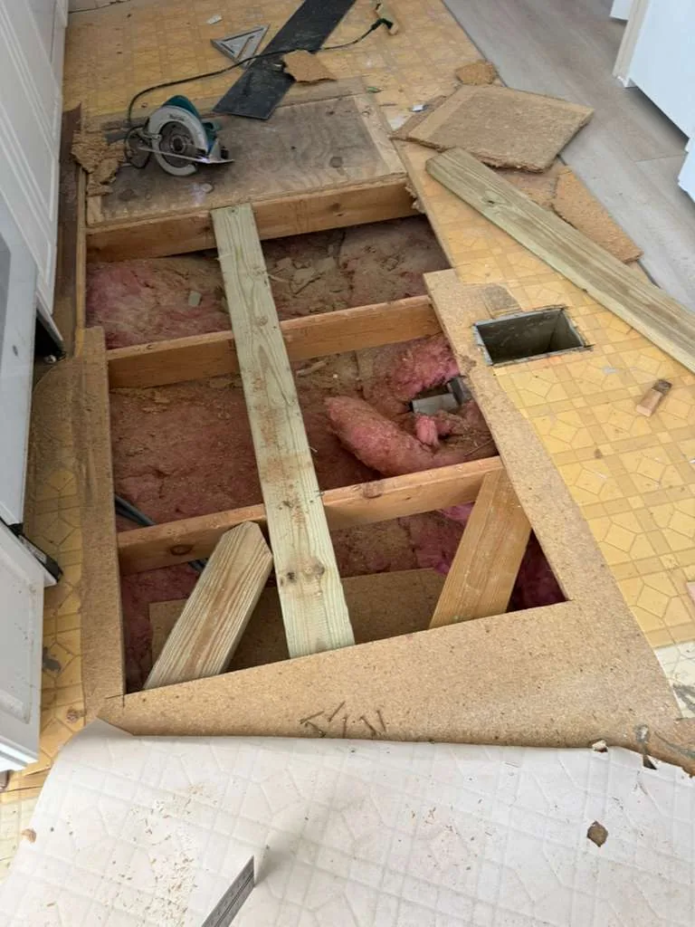 Exposed joists during damaged subfloor removal in Winter Garden