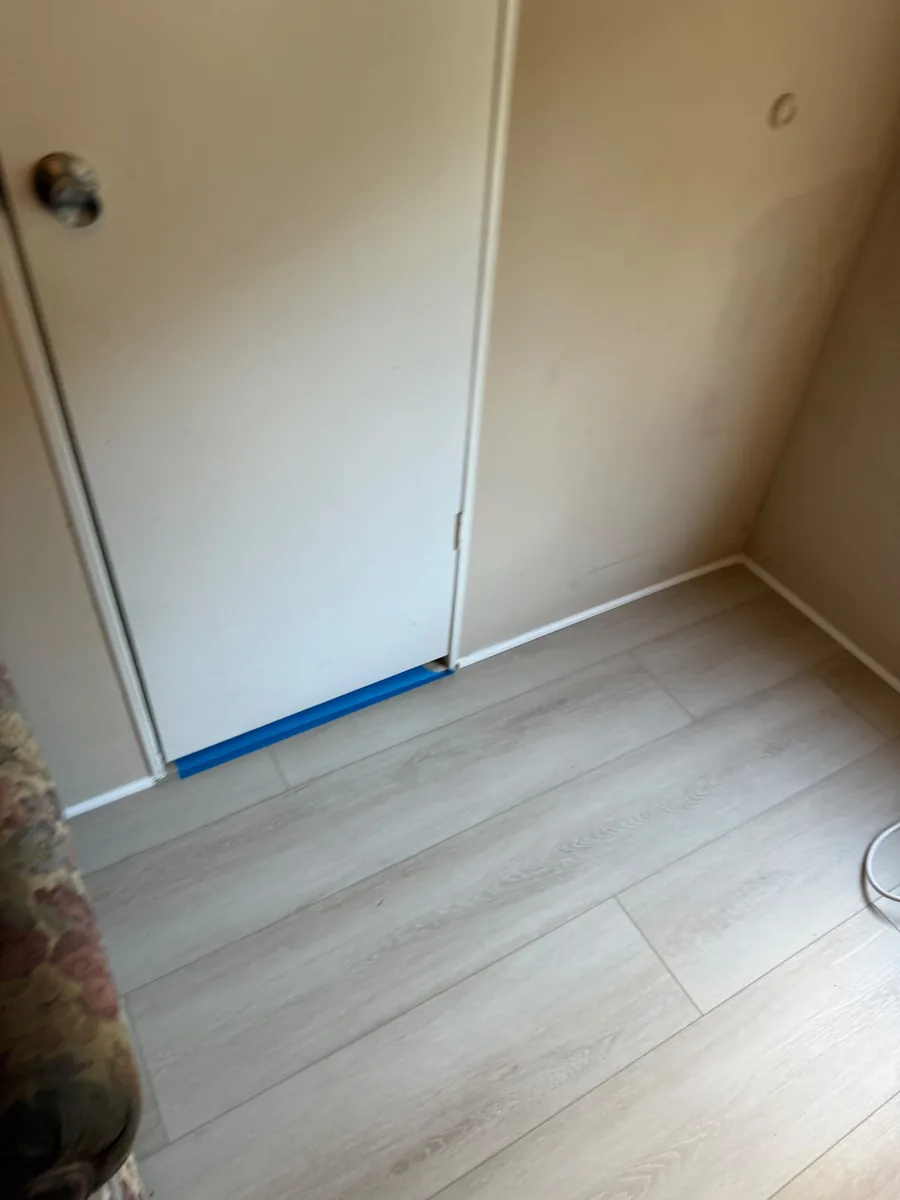 Completed vinyl flooring at a Winter Garden bedroom closet corner
