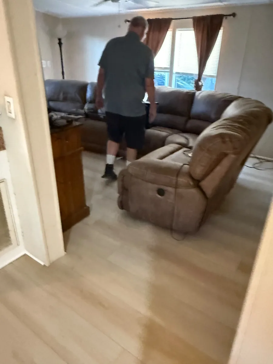 Wide view of completed vinyl flooring in a Winter Garden living room