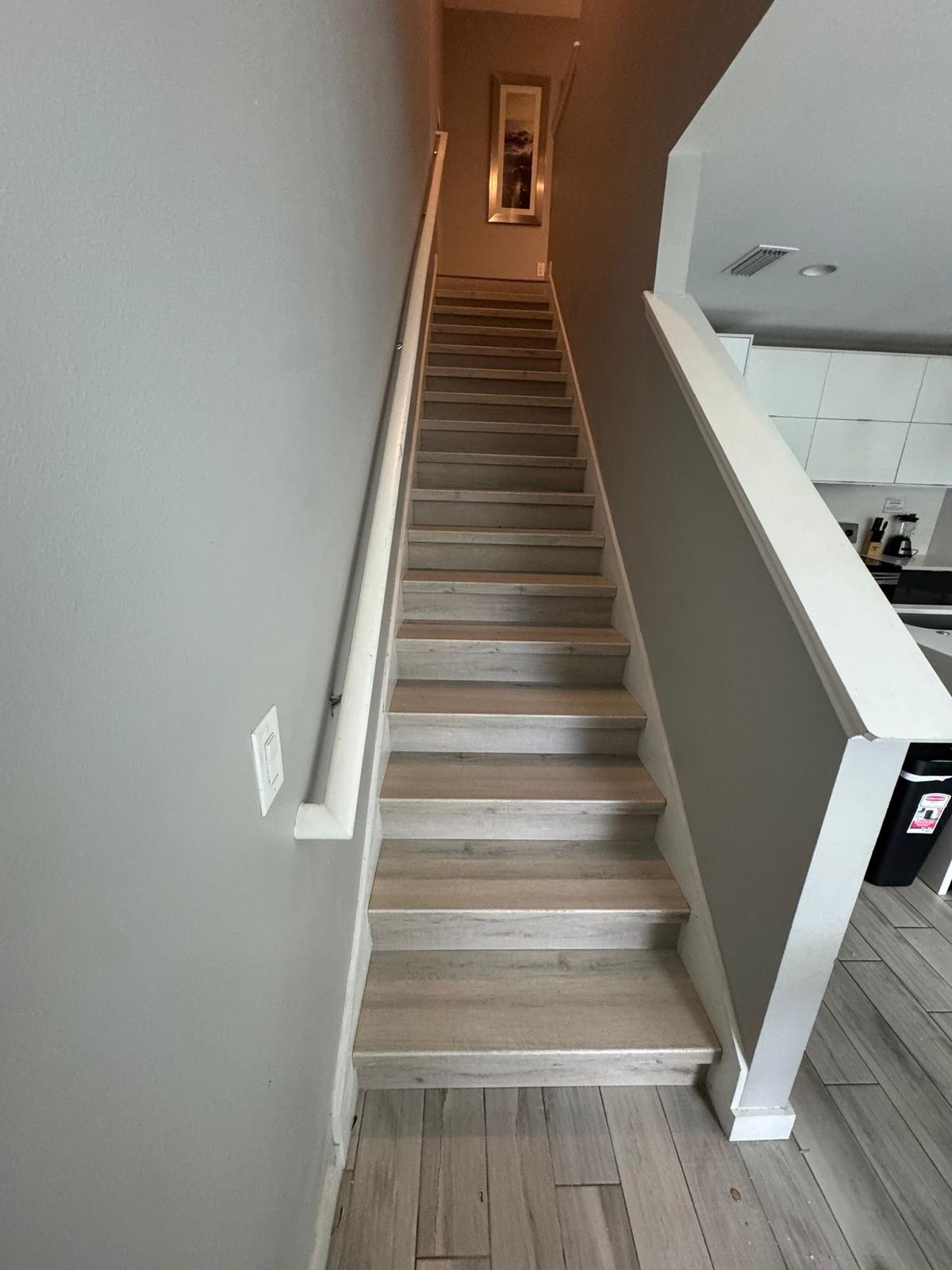 Completed LVP staircase installation